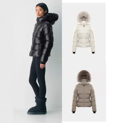 A woman in a black puffer jacket beside two more colourways of the same jacket